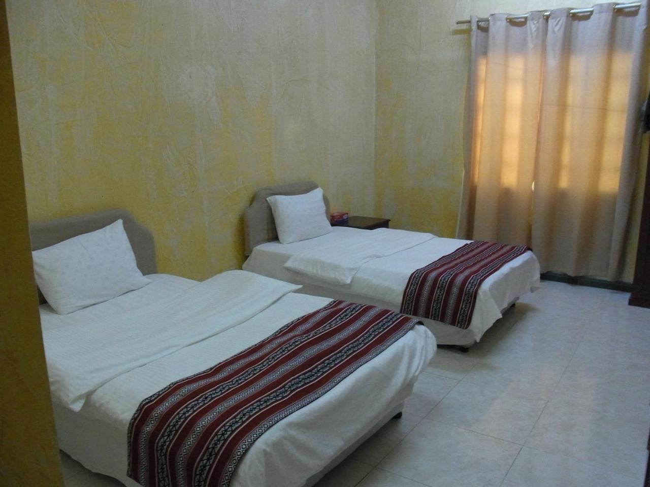 Al Ghazlan Hotel Sinaw Ruddah Esterno foto
