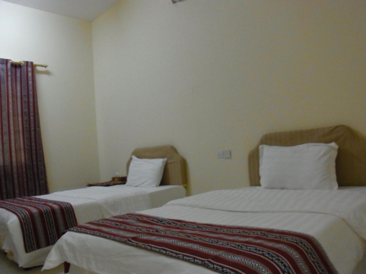 Al Ghazlan Hotel Sinaw Ruddah Esterno foto